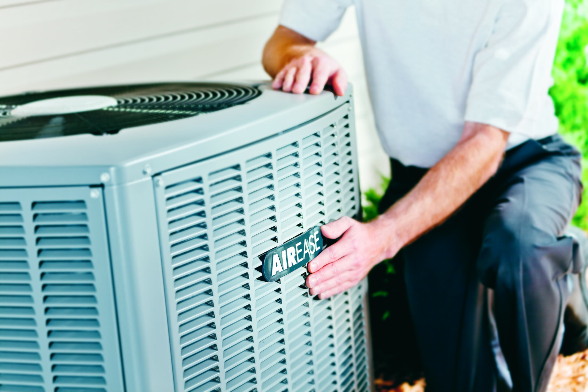 young-man-working-as-electrician-exposing-back-fridge-check-repair-it